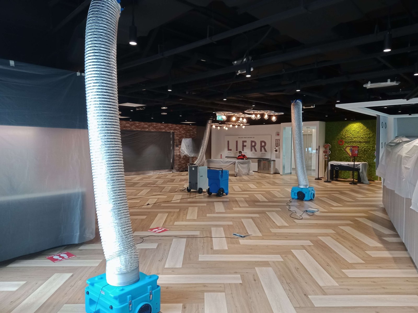 On-site air scrubbers and ducting set up for decontamination